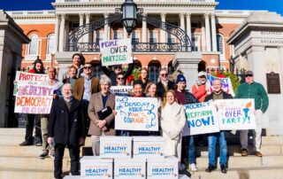CHD Activists Rally at State House Steps with Boxes